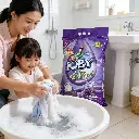 jimeng-2025-12-10-7156-年轻妈妈在明亮的卫生间手洗衣服，旁边放着一袋 JOBY Extra Perfum....webp